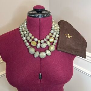 Kate Spade "give it a swirl" necklace in grey